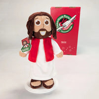 The Shoebox Jesus Doll stands in front of an Operation Christmas Child shoebox. A perfect WOW gift for shoebox donations. Bulk pricing available.