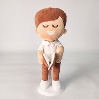 BibleBoy is the adorable plush boy doll that speaks 36 Bible verses. Holds his Bible with magnets in his hands and in the Bible. Wholesome dress. Clean cut hairstyle. Perfect gift idea for Christian boys. From Jesusdoll.com.
