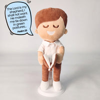 BibleBoy is the adorable plush boy doll that speaks 36 Bible verses.  Holds his Bible with magnets in his hands and in the Bible.  Wholesome dress.  Clean cut hairstyle.  Perfect gift idea for Christian boys.  From Jesusdoll.com.