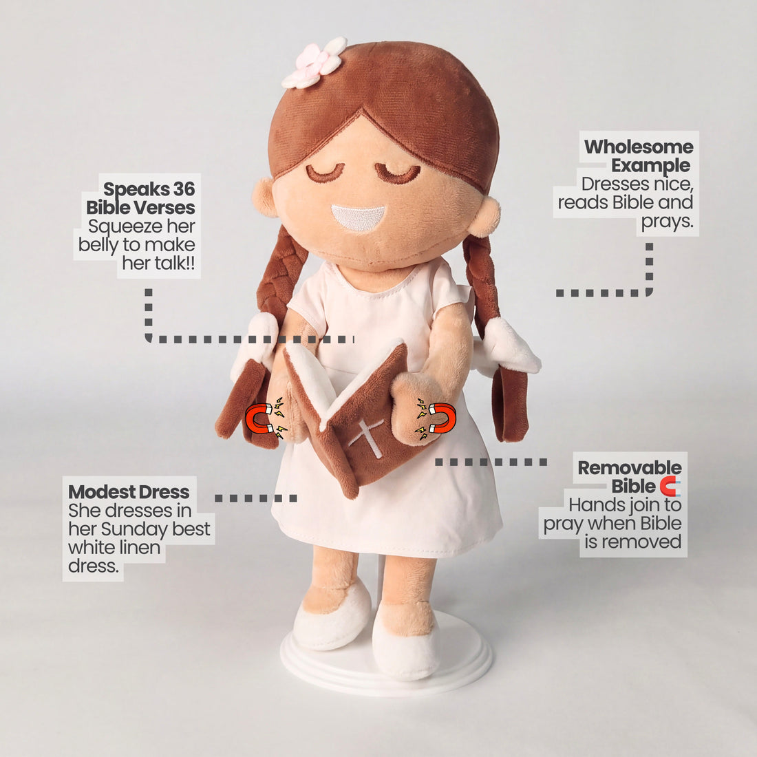 BibleGirl is the adorable plush girl doll that speaks 36 Bible verses.  Holds her Bible with magnets in her hands and in the Bible.  Wholesome dress.  Beautiful braids with bows and a flower in her hair.  Perfect birthday gift idea for Christian girls.  From Jesusdoll.com.