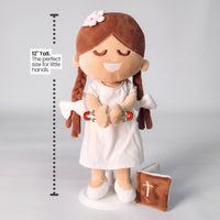BibleGirl is the adorable plush girl doll that speaks 36 Bible verses.  Holds her Bible with magnets in her hands and in the Bible.  Wholesome dress.  Beautiful braids with bows and a flower in her hair.  Perfect Baptismgift idea for Christian girls.  From Jesusdoll.com.